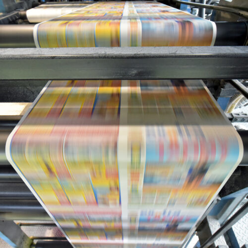 printing of coloured newspapers with an offset printing machine at a printing press company